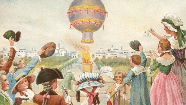 Historisches Sammelbild: Zuschauer jubeln dem ersten Aufstieg eines Heißluftballons zu. Erfunden wurde er von den Brüdern Montgolfier. | Bild: picture alliance / akg-images | akg-images